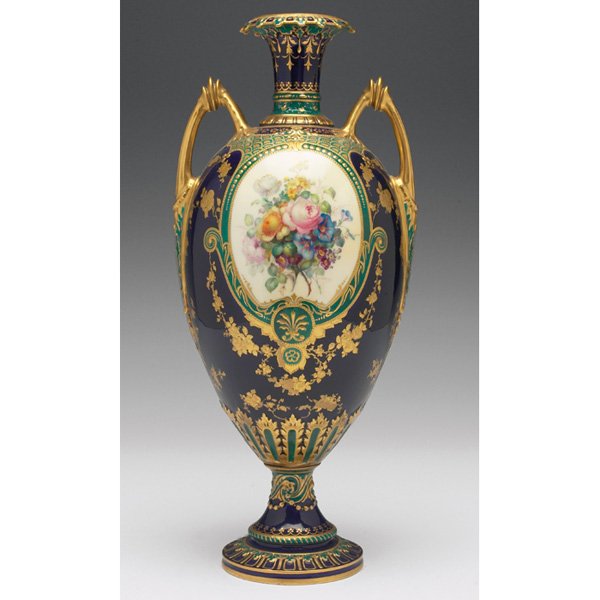 Royal Crown Derby vase, double handled urn shape: Royal Crown Derby vase, double handled urn shape, painted roses surrounded by gold and green embellishments and against a blue ground, marked, signed A. Gregory, #1251, 5"w x 11.25"h, glaze chipping
