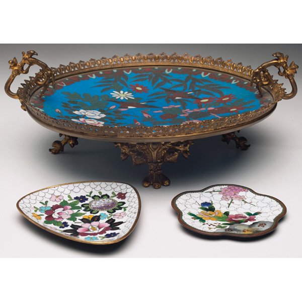 Cloisonné tray, handled form w/Cloisonné trays, t: Cloisonné tray, handled form with enameled design of flowers and birds against a blue background and framed in a reticulated gold ormolu frame, 10"dia; with Cloisonné trays, two, each with enameled