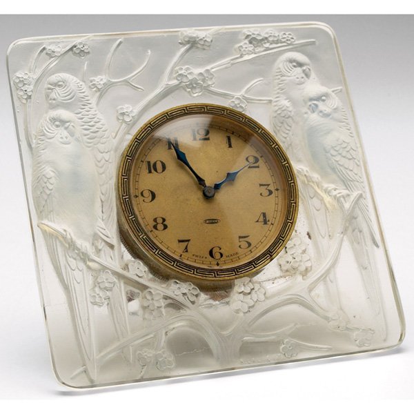 Rene Lalique clock, rectangular form in opalescen: Rene Lalique clock, rectangular form in opalescent clear glass with molded parrots in relief and bronze center clock face with geometric design, signed "R. Lalique", 4.5"sq