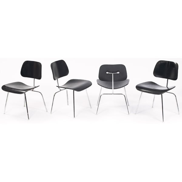 Eames DCMs, four, Herman Miller, black ash: Charles and Ray Eames DCMs, four, by Herman Miller, molded black aniline-dyed ash plywood seats and backs over chrome-plated steel legs with original glides, original finish, each with rectangular bla