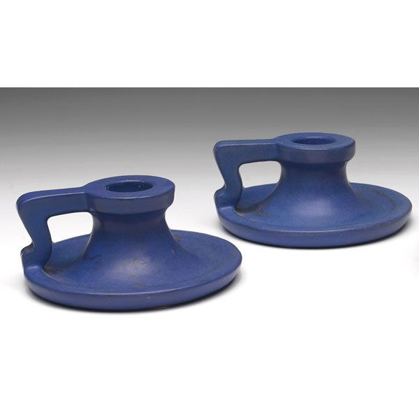 Teco chamber sticks, pair, designed by W.D. Gates: Teco chamber sticks, pair, designed by W.D. Gates, #258, covered in a blue matte glaze, impressed marks, 5"w x 2.5"h