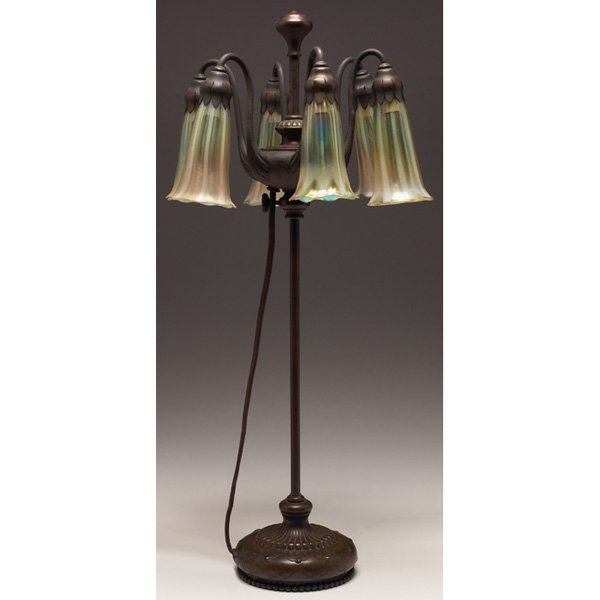 Tiffany Studios lamp, six-light lily, : Unusual Tiffany Studios lamp, six-light lily, bronze base with an exceptional original patina holding six favrile glass shades with overall opalescence, base marked S1225, shades are numbered in the m