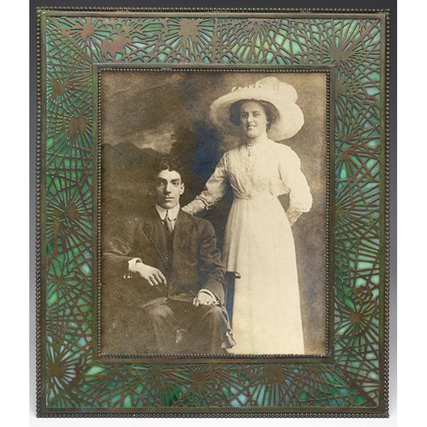 Tiffany Studios frame, pine needle pattern: Good Tiffany Studios frame, bronze in the pine needle pattern over green and white glass, original patina, signed Tiffany Studios, New York, #916, 12.5"w x 14.5"h