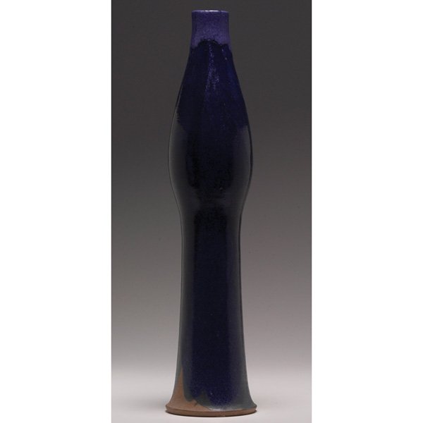 William Wyman vase, large unusual shape: Good William Wyman vase, large unusual shape covered in a multi-toned blue matt glaze, signed, dated 1958, 4"w x 17.5"h