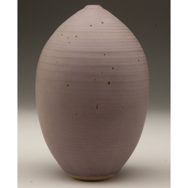 Otto Heino vase, light purple glaze: Otto Heino vase, bulbous shape covered in a light purple glaze with brown accents, signed, 5"w x 8"h
