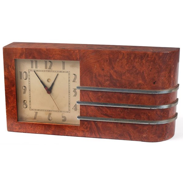 Gilbert Rohde clock, by Howard Miller, 1933: Gilbert Rohde clock, by Howard Miller, 1933, Maidou burl case with polished metal banded trim, original finish, metal tag reads "1933 A Century of Progress Chicago. Original Design World's Fair Clocks