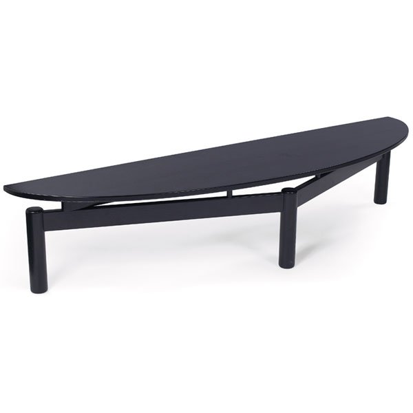 Vico Magistretti "Sinbad" coffee table: Vico Magistretti "Sinbad" coffee table, by Cassina, narrow form with one curved side and one flat side, oak with original ebonized finish, Cassina paper label, 72"w x 17.75"d x 15"h, light wear to fin