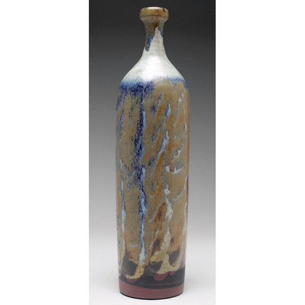 William Wyman vase, tall shape: William Wyman vase, tall shape in brown clay under a mottled blue, green, gray and brown matte glaze, signed, 3.5"h x 13"h