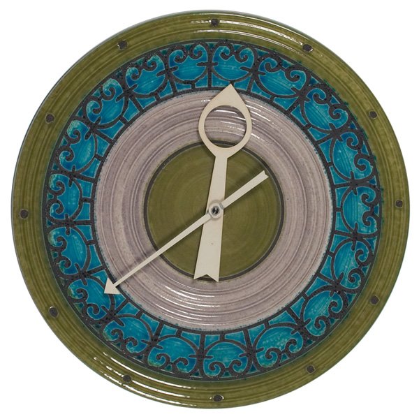 George Nelson Associates clock: George Nelson Associates clock, by Howard Miller, model 7574, ceramic with blue and green glaze, white enameled metal hands, battery operated, Howard Miller label, 14"dia, excellent condition