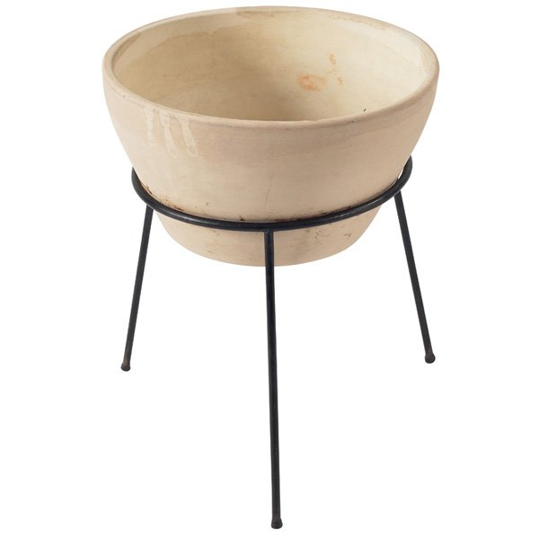 Rex Goode and John Follis Architectural Pottery: Rex Goode and John Follis Architectural Pottery planter of bisque clay in a black metal tripod stand, bottom of vessel stamped "Architectural Pottery Made in USA", 16.75"dia x 21.25"h, very good condi
