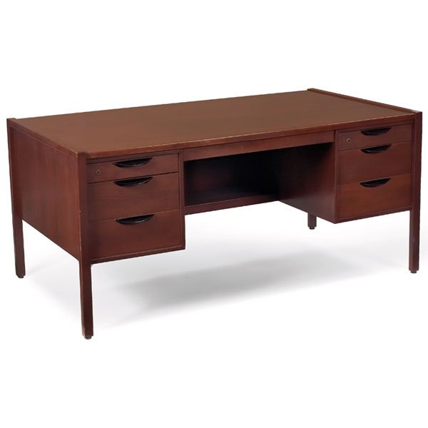 Jens Risom desk, signed: Jens Risom desk, by Jens Risom Design, Inc., walnut, two banks of drawers, central drawer under top, privacy panel, black enameled drawer pulls, signed with metal tag, refinished, 62w x 34d x 28.5h, v
