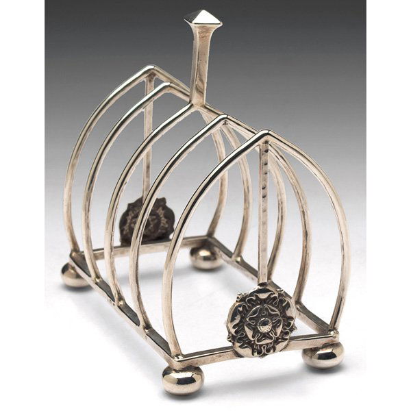 AE Jones toast rack: AE Jones toast rack, sterling silverwith tooled floral designs, marked, #599,4"w x 4"h