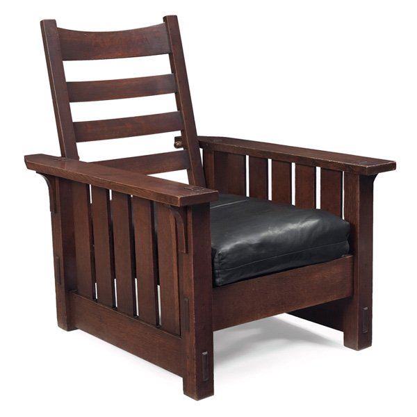 Gustav Stickley: Gustav Stickley Morris chair, #332, five vertical slats under each arm with corbel supports at sides, replaced cane foundation and cushions, unsigned, lightly recoated original finish, 31.5"w x 38"d x