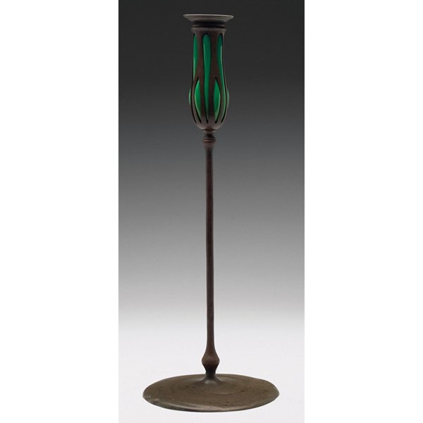 Tiffany Studios: Tiffany Studios candlestick, large form in bronze with blown green glass at top, original patina, unsigned, #21100, 5.75"w x 16"h