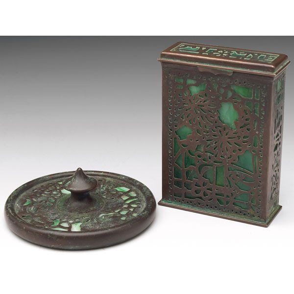 Tiffany Studios: Tiffany Studios paperweight, bronze in the grapevine pattern over green and white glass, original patina, signed Tiffany Studios, New York, 3.75"dia, minor crack to glass; with a Tiffany Studios card