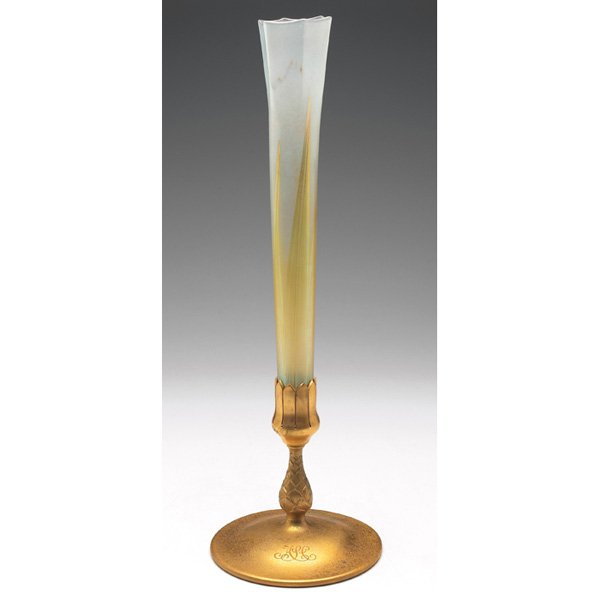 Tiffany Studios: Tiffany Studios vase, fluted form in frosted favrile glass with a pulled feather design in gold, held in a bronze base with an original gold dore patina and monogram, glass signed L.C.T., base signed