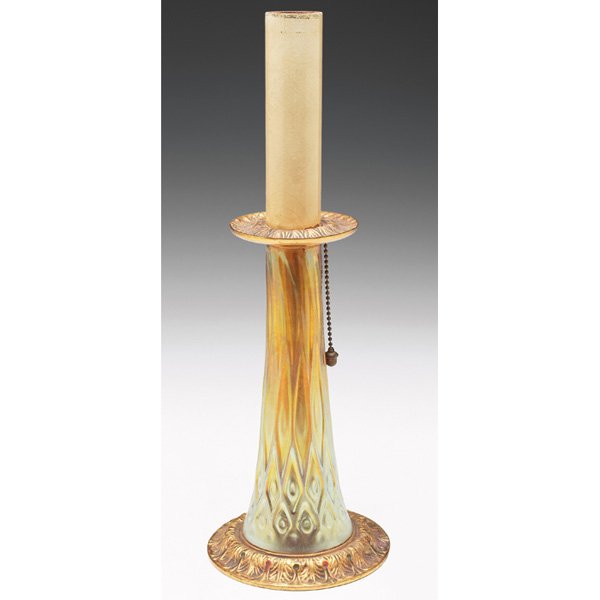 Tiffany Furnaces: Tiffany Furnaces lamp base, bronze fittings with an original gold dore patina, gold favrile glass body with geometric designs and a nice overall iridescence, signed Louis C. Tiffany Furnaces, Inc., Fa