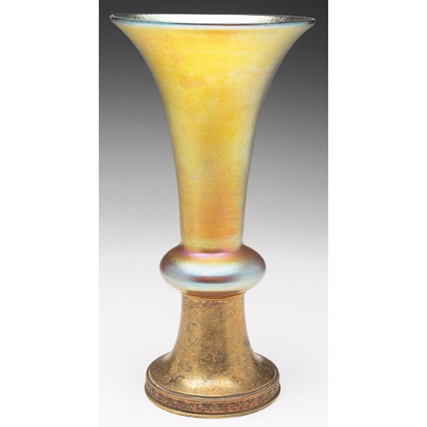 Tiffany Furnaces: Tiffany Furnaces vase, flaring form in gold favrile glass with a nice overall iridescence, bronze foot with an original gold dore patina, base signed Louis C. Tiffany Furnaces, Inc., Favrile, #164, 6"