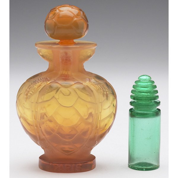 Lalique, R. Lalique: Lalique perfume bottle, for Morabito No. 7, Paris, amber-colored glass with tortoises, 3"w x 4.5"h, chip to foot; with an R. Lalique perfume bottle, green glass with beehive stopper, .75"w x 2.5"h, bo
