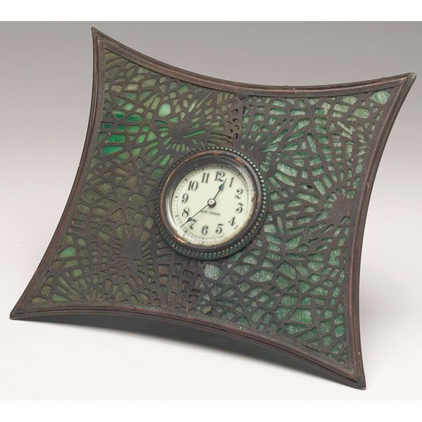 Art Nouveau, Seth Thomas: Art Nouveau clock, bronzed metal with a pine needle pattern over mottled green glass, clock face with Seth Thomas mark, 8.25"w x 7"h, replaced glass panels on one side with cracks
