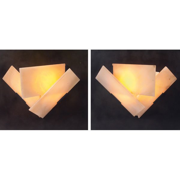 Pierre Chareau Mouche wall sconces, pair, 1990s: Pierre Chareau "Mouche" wall sconces, pair, 1990s production of the 1920s design, each with three alabaster plates mounted on a black metal frame, 12.25"w x 5"d x 11"h, very good condition