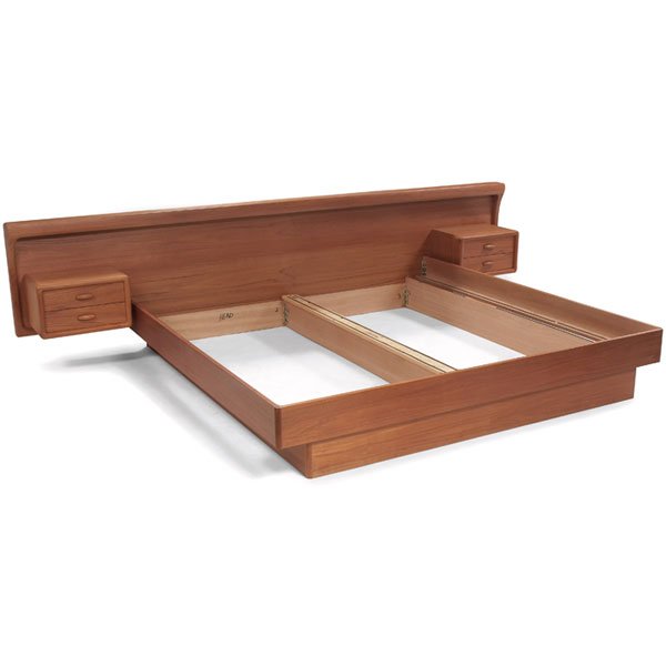 Dyrlund king size bed, Denmark, teak: Dyrlund king size bed, Denmark, teak, two nightstands each with two drawers, overhanging top conceals lights, two plugs to back, Dyrlund tag in drawer, overall: 126"w x 32"h, fits a 78" mattress, orig