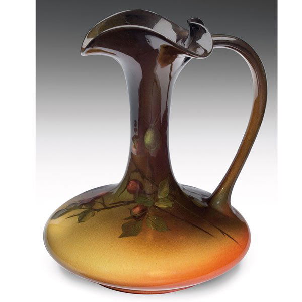 Rookwood handled vessel, Standard glaze: Rookwood handled vessel, Standard glaze with nicely painted rose hips and leaves, executed by E.T. Hurley in 1898, #715, 6”w x 7”h