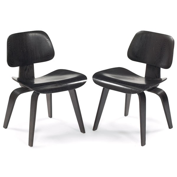 Charles and Ray Eames DCWs, pair, ebonized ash : Charles and Ray Eames DCWs, pair, by Herman Miller, 1950s, ebonized molded ash plywood, one stamped "DCW", original oval shock mounts to backs, original finish, 19"w x 21"d x 29"h, very good original 