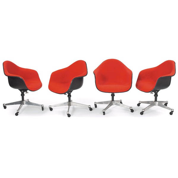 Eames shell chairs, 4, dark gray/red: Charles and Ray Eames shell chairs, four, by Herman Miller, dark gray fiberglass shells with original red-orange wool upholstery over four-point aluminum bases on castors, tilt and swivel, 26"w x 24"d