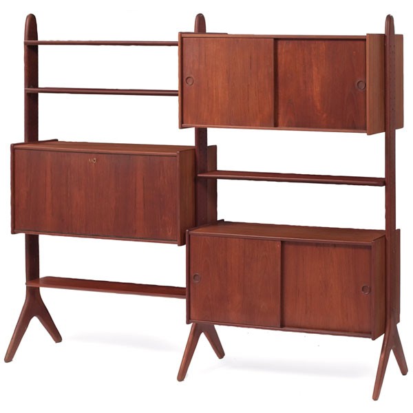 Danish Modern wall unit teak forked base free-stan: Danish Modern wall unit, 1960s, teak, three vertical supports with forked bases, two cabinets with sliding doors and one interior shelf, one locking drop-front desk cabinet with drawers and compartmen