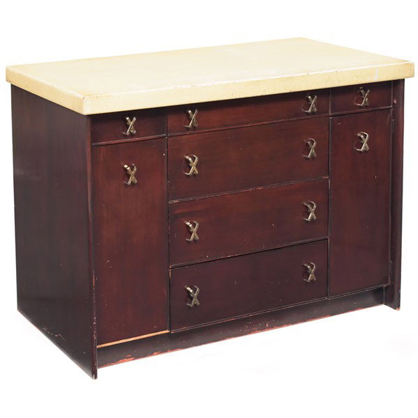 Paul Frankl cabinet, Johnson Furniture Co., cork t: Paul Frankl cabinet, by Johnson Furniture Co., USA, 1950s, cork top over a mahogany cabinet with four drawers at center flanked by a small drawer over a door, all with the original X-shaped pulls, top
