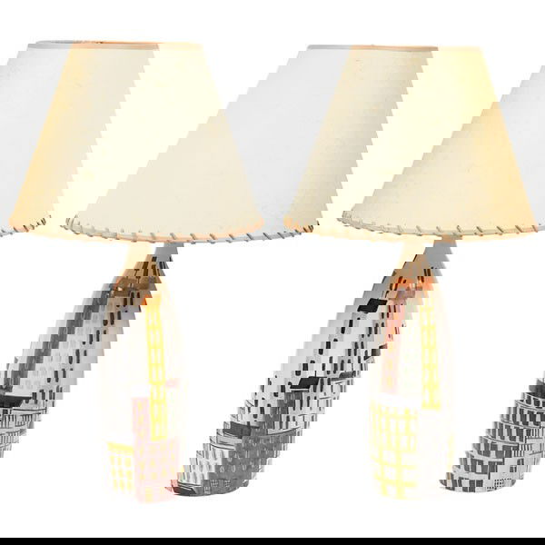 Raymor lamps, pair, Italy, ceramic, cityscapes: Raymor lamps, pair, Italy, ceramic, colorful decoration of city buildings on a white background, paper shades with leather stitched trim, one signed "Made in Italy" on base, base only: 18"h, mint cond