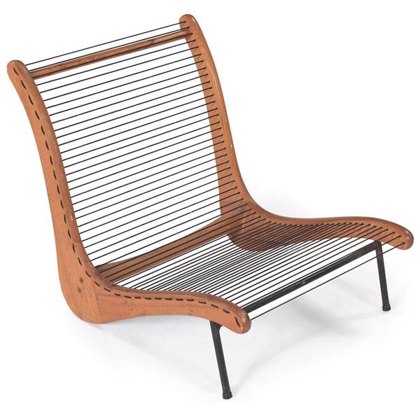 Tubbs low lounge chair, signed, petite: Tubbs low lounge chair, in the style of Maurice Martine or Alexey Brodovitch, 1950s, plywood frame with two black metal legs, string seat, branded mark "Tubbs Wallingford VT," original finish, 19"w x