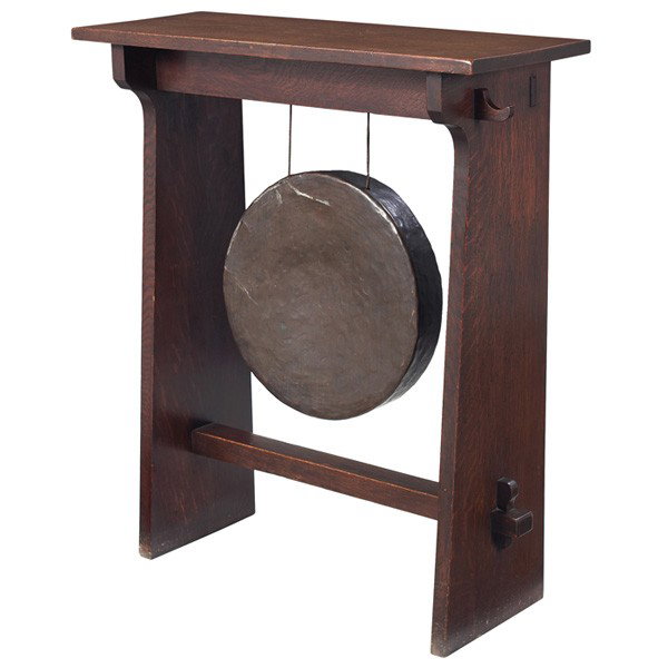 Gustav Stickley dinner gong, #812: Gustav Stickley dinner gong, #812, original copper gong, overhanging top supported by slab sides with thru-tenon construction, original finish to base, top refinished, repair to original gong, missing