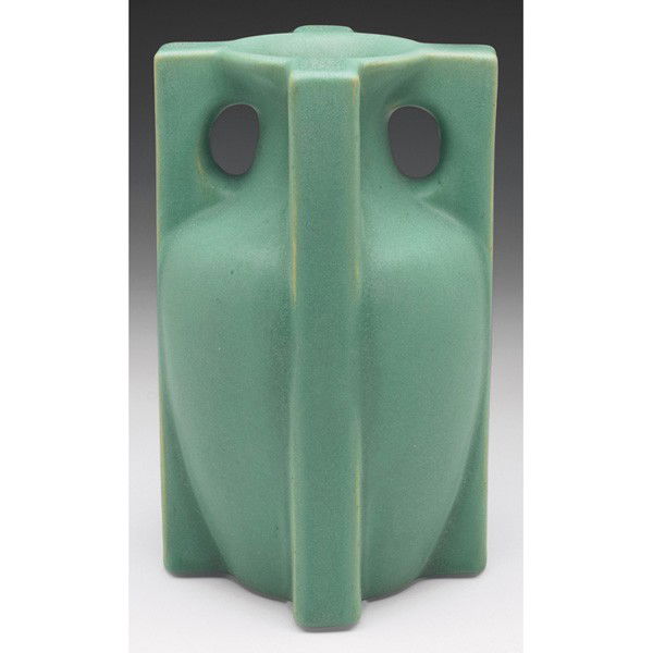 Teco vase, #435A, designed by W.D. Gates, handled: Teco vase, #435A, designed by W.D. Gates, handled four-buttress shape, under a good green matte glaze, impressed marks, 4.25"w x 7.25"h, repaired chip