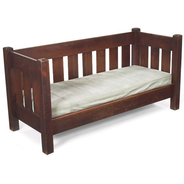 Limbert settle, #654 1/2, even-arm form with eight: Limbert settle, #654 1/2, even-arm form with eight vertical slats at back and three under each arm, nicely recovered leather seat cushion, original foundation, branded signature, original finish, 74"w