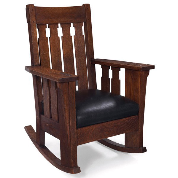 Arts and Crafts rocker, possibly Charles Stickley,: Arts and Crafts rocker, possibly Charles Stickley, notched vertical slats at back and sides over a replaced leather seat, wide-thru tenon construction at arms, cleaned original finish, 30"w x 28"d x 4