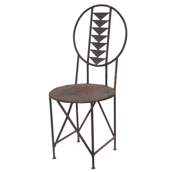 Prairie School chair, after a design by Frank Lloy: Prairie School chair, after a design by Frank Lloyd Wright for Midway Gardens, in iron, triangular design at back over a solid seat, some rust, age unknown, 16"w x 17"d x 37"h, very good condition