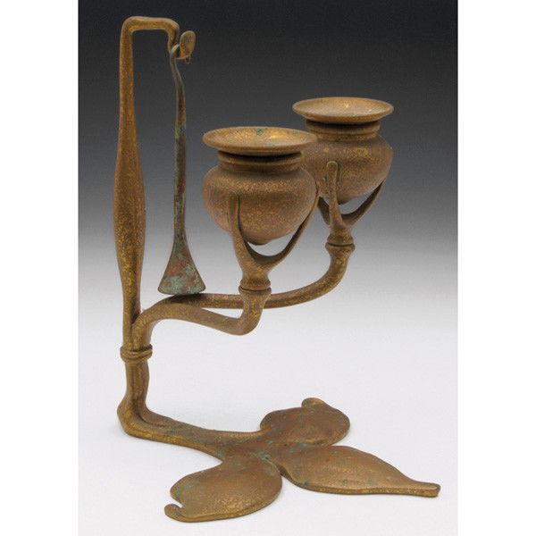 Tiffany Studios candlestick, double holder form wi: Tiffany Studios candlestick, double holder form with a fleur-de-lis design in bronze, original gold dore patina, original hanging snuffer, removable bobeche, signed Tiffany Studios, New York, #1232, 7