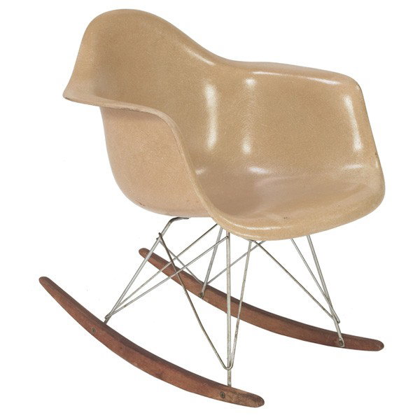 Charles and Ray Eames RAR (rocking chair), by Herm: Charles and Ray Eames RAR (rocking chair), by Herman Miller, molded greige fiberglass shell, zinc struts, birch runners, original finish to runners, stamped with Herman Miller mark in shell, 25"w x 28