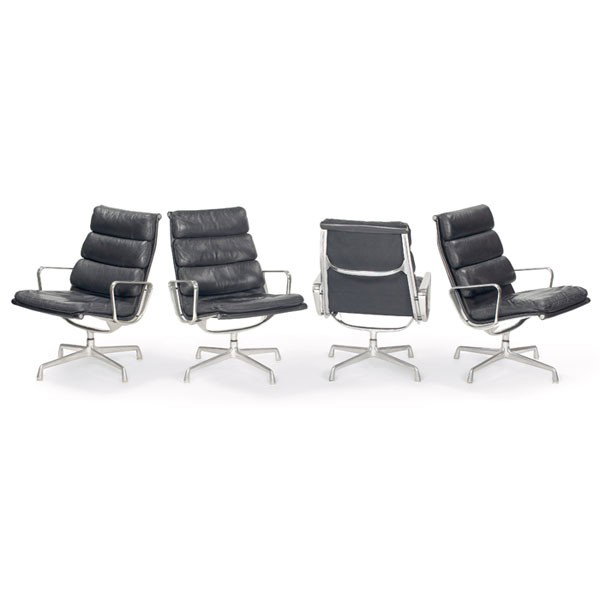 Charles and Ray Eames Soft Pad lounge chairs, by H: Charles and Ray Eames Soft Pad lounge chairs, by Herman Miller, four, high-back version upholstered in original black leather in an aluminum frame, early four-point base, swivel mechanism, all signed,