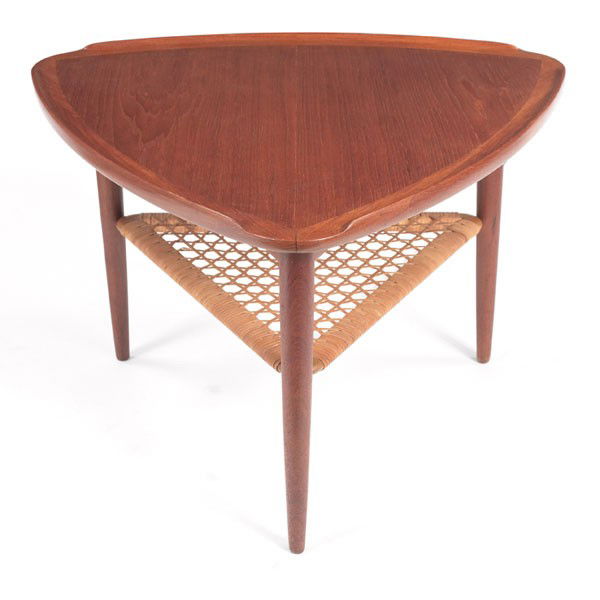 Poul Jensen occasional table, for Selig, Denmark,: Poul Jensen occasional table, for Selig, Denmark, teak, triangular top with raised lip to edges over a caned lower shelf, original finish, Selig metal decal, 26"dia. x 17"h, very good original conditi