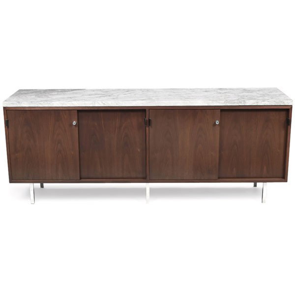Florence Knoll cabinet, by Knoll, walnut, marble : Florence Knoll cabinet, by Knoll, walnut, marble top, four sliding doors with black leather pulls, polished steel legs, locks, original finish, 71.5"w x 18"d x 28.5"h, professionally repaired crack to
