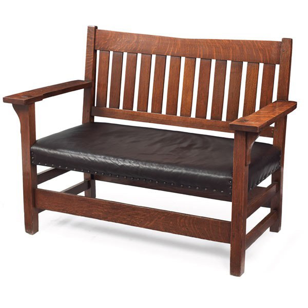 Gustav Stickley settee, #212, "V" back form with tw: Gustav Stickley settee, #212, "V" back form with twelve vertical slats over a recovered seat, recoated original finish, signed with red decal, 47"w x 24"d x 36"h, very good condition