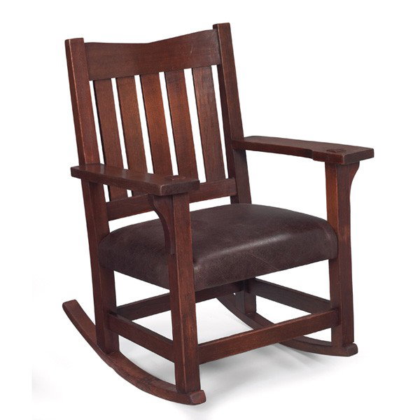 Gustav Stickley rocker, #311, "V" back form over a: Gustav Stickley rocker, #311, "V" back form over a replaced leather seat, cleaned original finish, branded signature, 26"w x 29"d x 35"h, very good condition