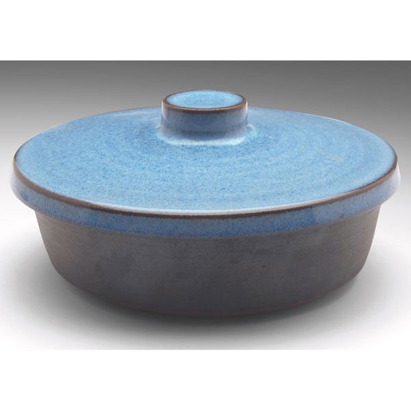 Rupert Deese covered vessel, low form, brown clay: Rupert Deese covered vessel, Claremont, California, low form in brown clay covered with a blue glaze, signed, two paper labels, 5"w x 2.5"h