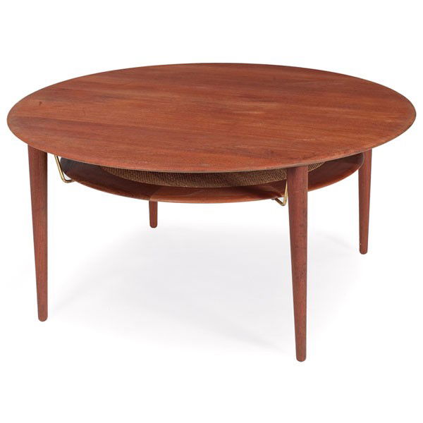 Peter Hvidt & Orla Nielsen coffee table, round: Peter Hvidt and Orla Nielsen coffee table, by France and Sons, Denmark, round teak top over caned lower shelf, signed with metal tag, 39"dia x 19.5"h, tear to caning, otherwise very good condition