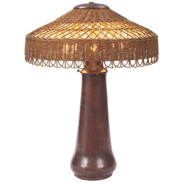 Gustav Stickley table lamp, #57: Gustav Stickley table lamp, #57, hammered copper base supports a replaced woven shade with silk liner, signed with impressed mark, some touch up to original patina, 18"dia x 25"h, very good condition