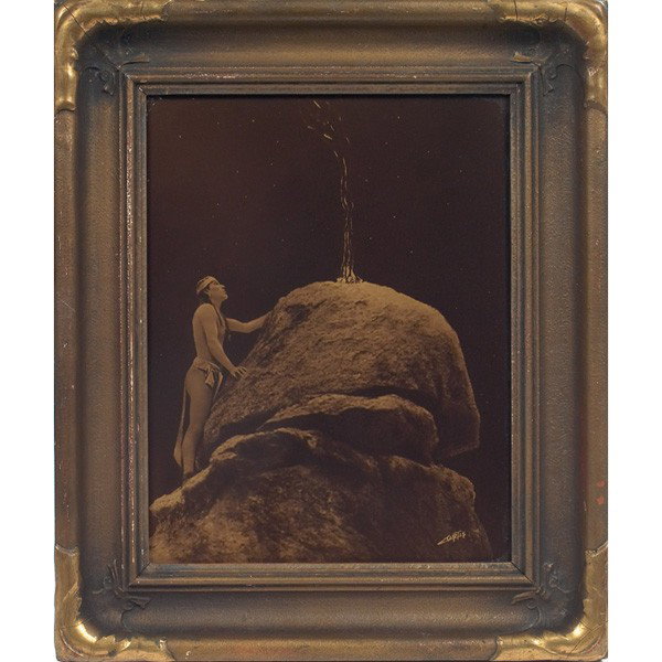 Edward Sheriff Curtis orotone: Edward Sheriff Curtis orotone, "Signal Fire to the Mountain Gods," signed in negative lower right, image: 11" x 14", overall: 16" x 19", with partial original Curtis Studio label on verso, held in ori