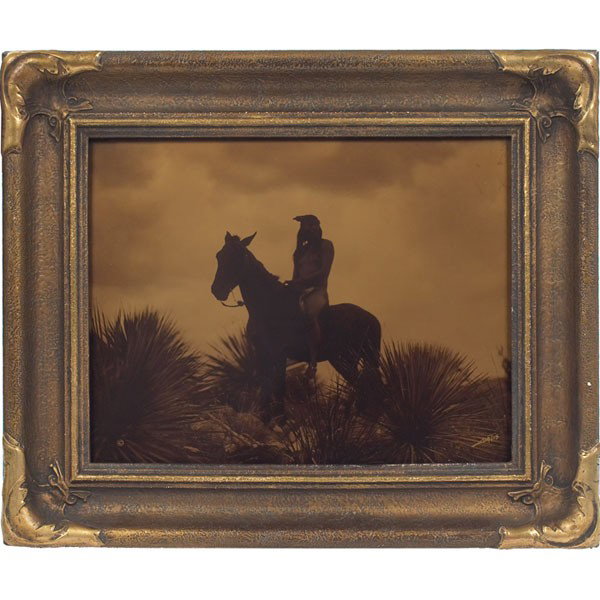 Edward Sheriff Curtis orotone: Edward Sheriff Curtis orotone, "The Scout," signed in negative lower right, image: 11" x 14", overall: 16" x 19", great image held in original Curtis Studio frame, excellent condition